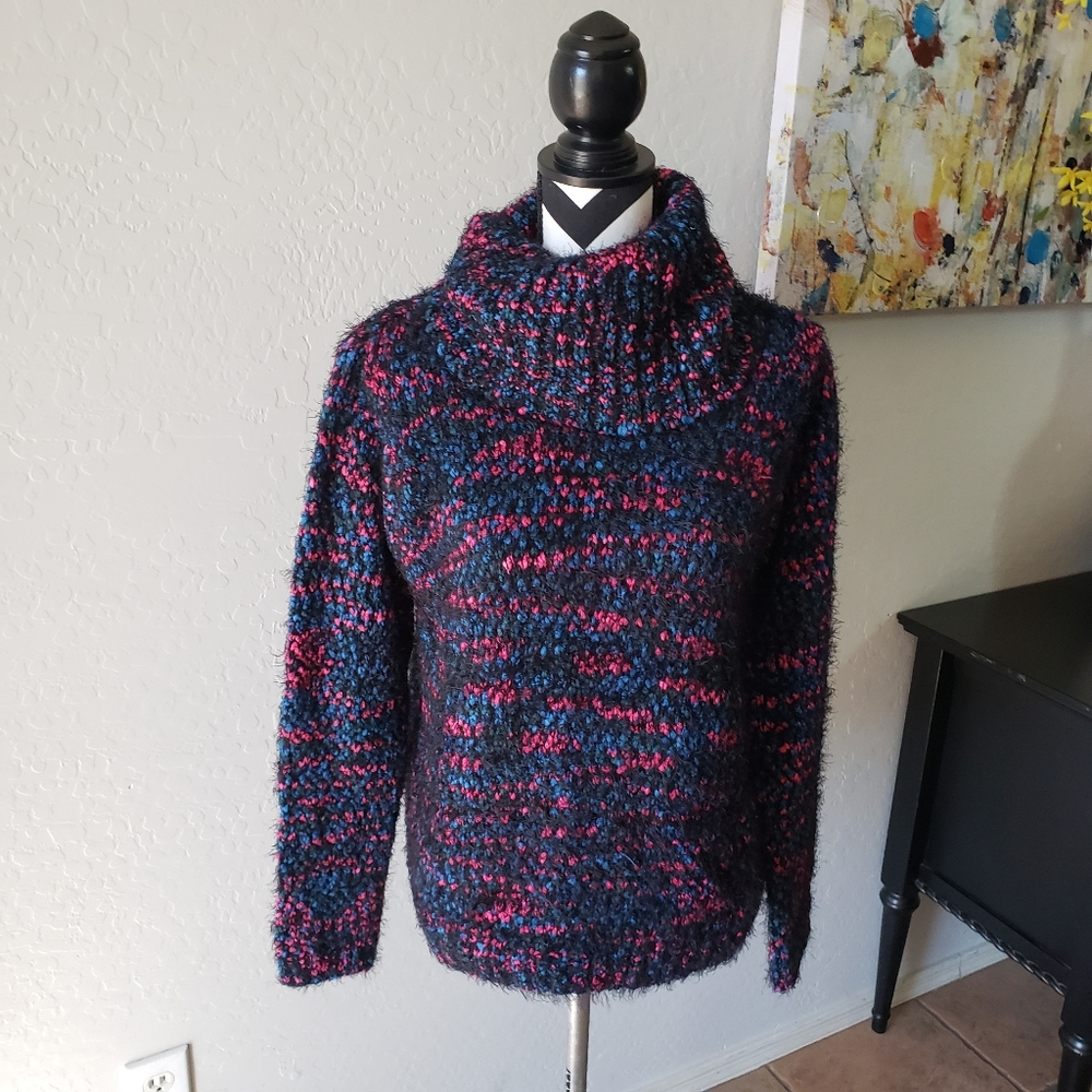 Mark sweater.